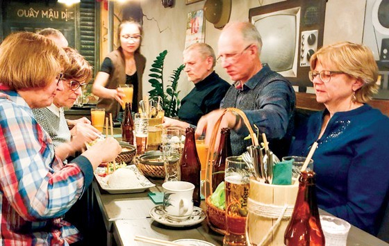 Many German enjoy Vietnamese food at a restaurant owned by Vietnamese people