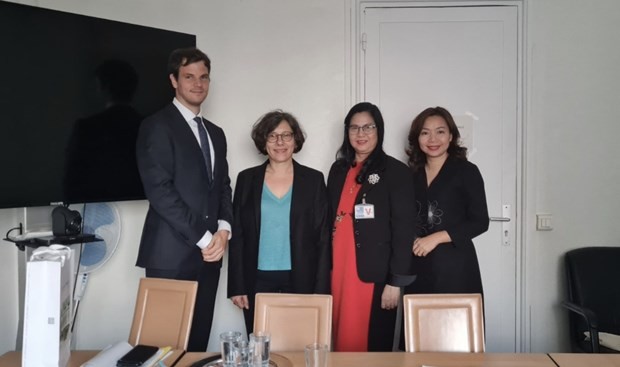 Associate Professor Dr. Tran Thi Giang Huong (second from right) in a meeting with French authorities. (Photo: VNA)