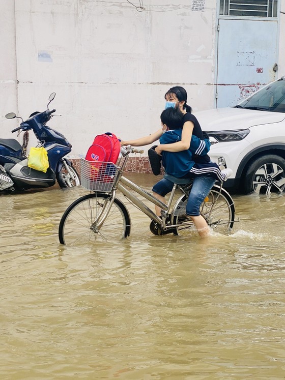 A mother takes her child to school