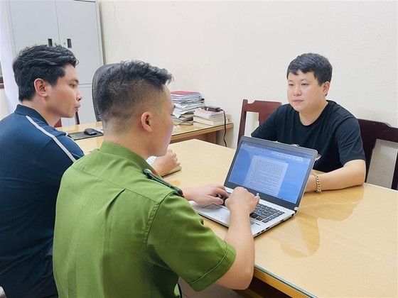 Pham Viet Trung at police station