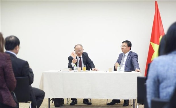 Prof. Hoang Chi Bao introduces President Ho Chi Minh's testament at the event. (Photo: VNA)