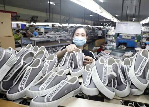 Shoes are made at a factory in Hanoi. Footwear raw materials are among the items that accounted for a large proportion of Vietnam's import turnover from the UK in the first half of this year. (Photo: VNA) Shoes are made at a factory in Hanoi. Footwear raw materials are among the items that accounted for a large proportion of Vietnam's import turnover from the UK in the first half of this year. (Photo: VNA)