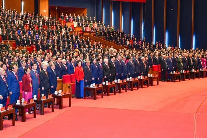 Party and State leaders, former leaders, and delegates attending the opening session on the morning of January 20. (Photo: SGGP/Viet Chung)