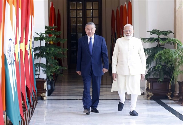 501359_5473341858954182_vna_potal_tong_bi_thu_chu_tich_nuoc_to_lam_va_thu_tuong_an_do_narendra_modi_gap_hep_8744134.jpg