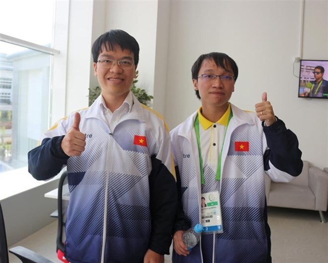 Le Quang Liem (L) and Nguyen Ngoc Truong Son (Photo: Huu Binh)