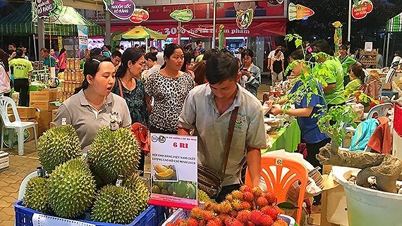 Fruit booths are displayed at the fair