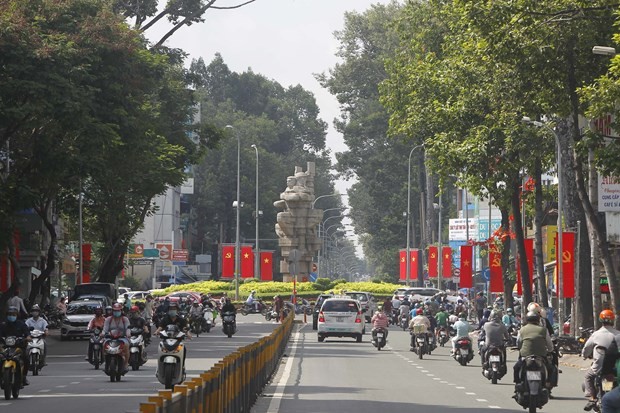 Le Hong Phong Street in HCMC decorated with flags and banners in the run up to the National Day September 2 (Photo: VNA)