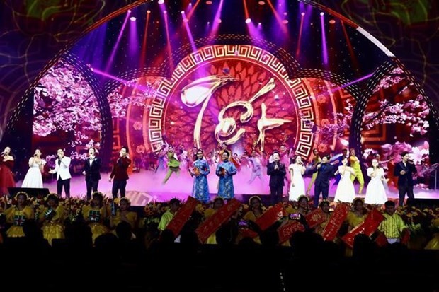 An art performance at the programme on January 14 (Photo: VNA)