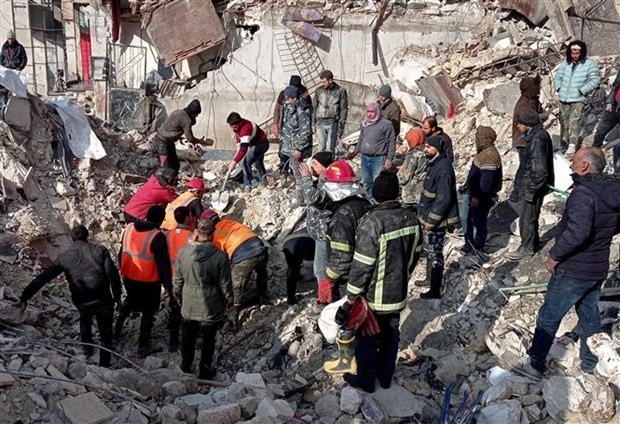 Search and rescue force works to find victims of the earthquake in al-Masharqa, Aleppo, north Syria, on February 7, 2023. (Photo: Xinhua/VNA)(Photo: VNA)