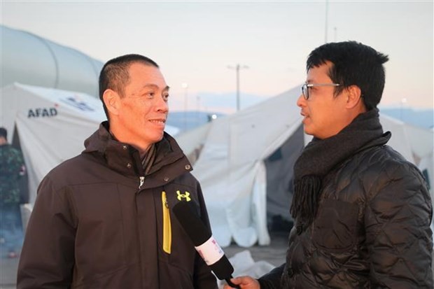 Vietnamese Ambassador to Turkey Do Son Hai (L) gives an interview.