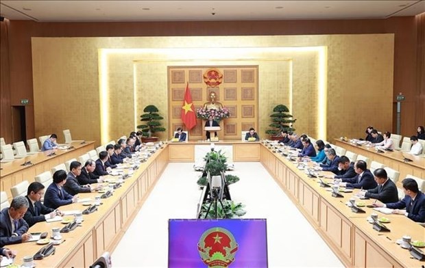 PM Pham Minh Chinh meets with chiefs of Vietnamese representative offices abroad. (Photo: VNA)