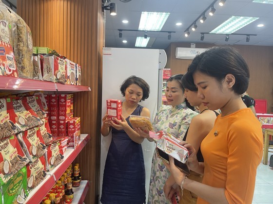 Many OCOP products are displayed at the event.