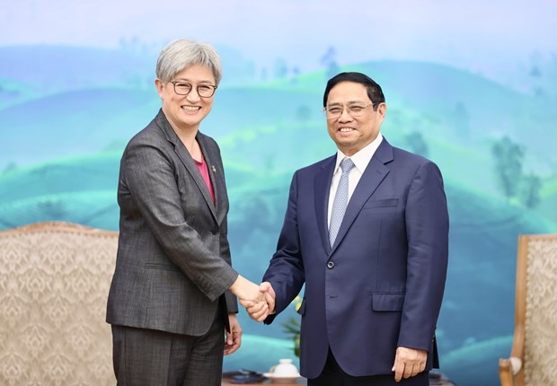 Prime Minister Pham Minh Chinh (R) and Australian Minister for Foreign Affairs Penny Wong at the meeting in Hanoi on August 22.