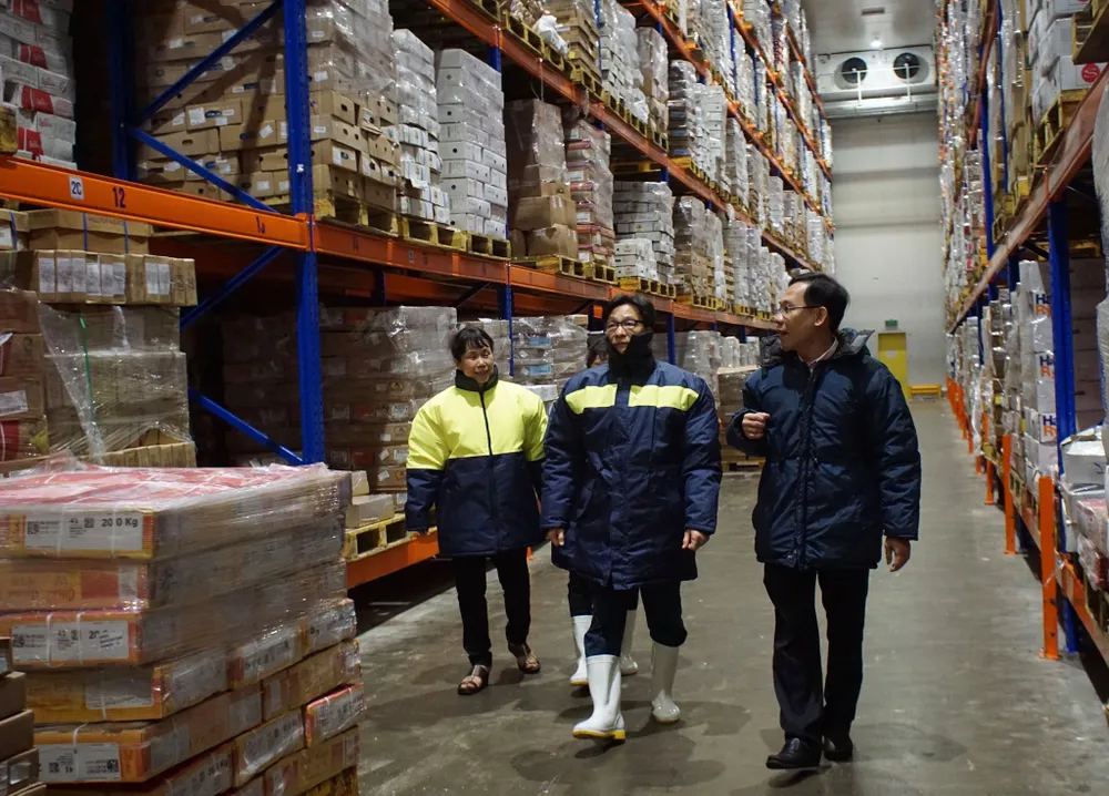 Phó thủ tướng Vũ Đức Đam thị sát chợ đầu mối Bình Điền lúc nửa đêm ảnh 5