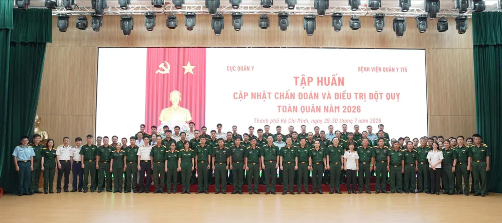 Các học viên chụp hình lưu niệm tại buổi tập huấn Ảnh: TRẦN CHÍNH