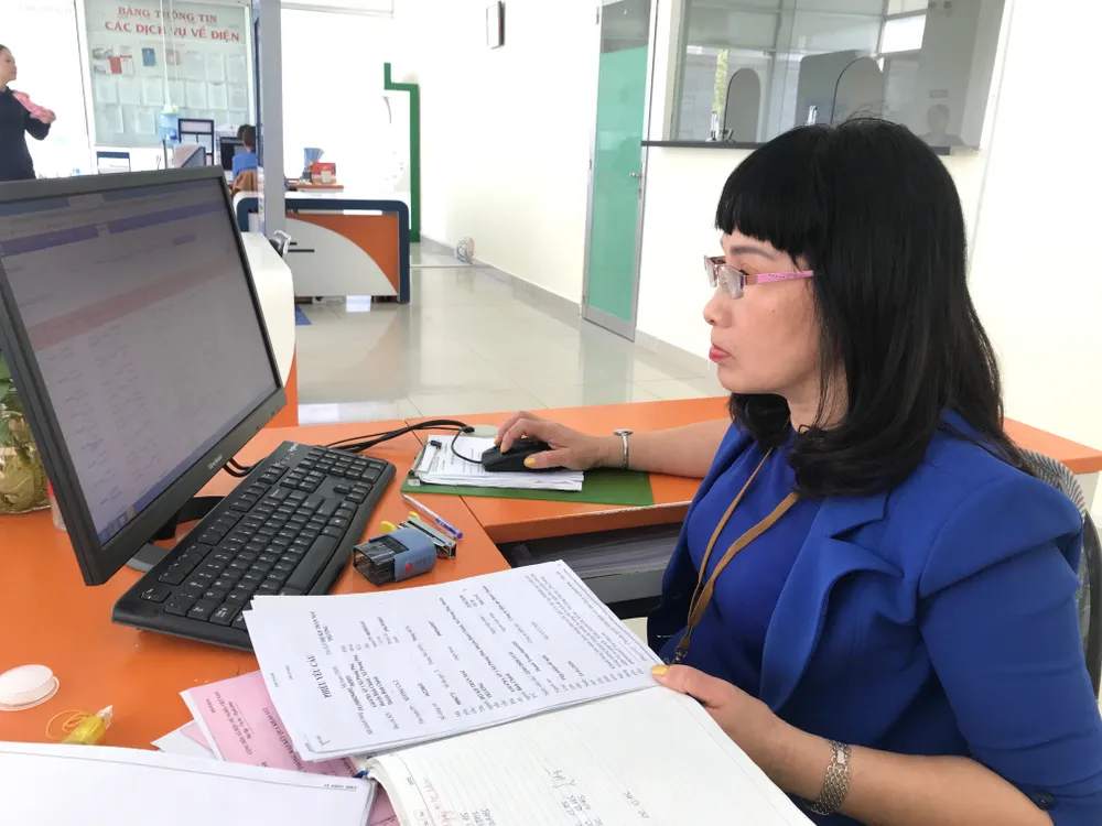 Ngày đầu tiên đi làm sau kỳ nghỉ Tết Canh Tý: Nhiều người dân, khách hàng sử dụng dịch vụ trực tuyến ảnh 2