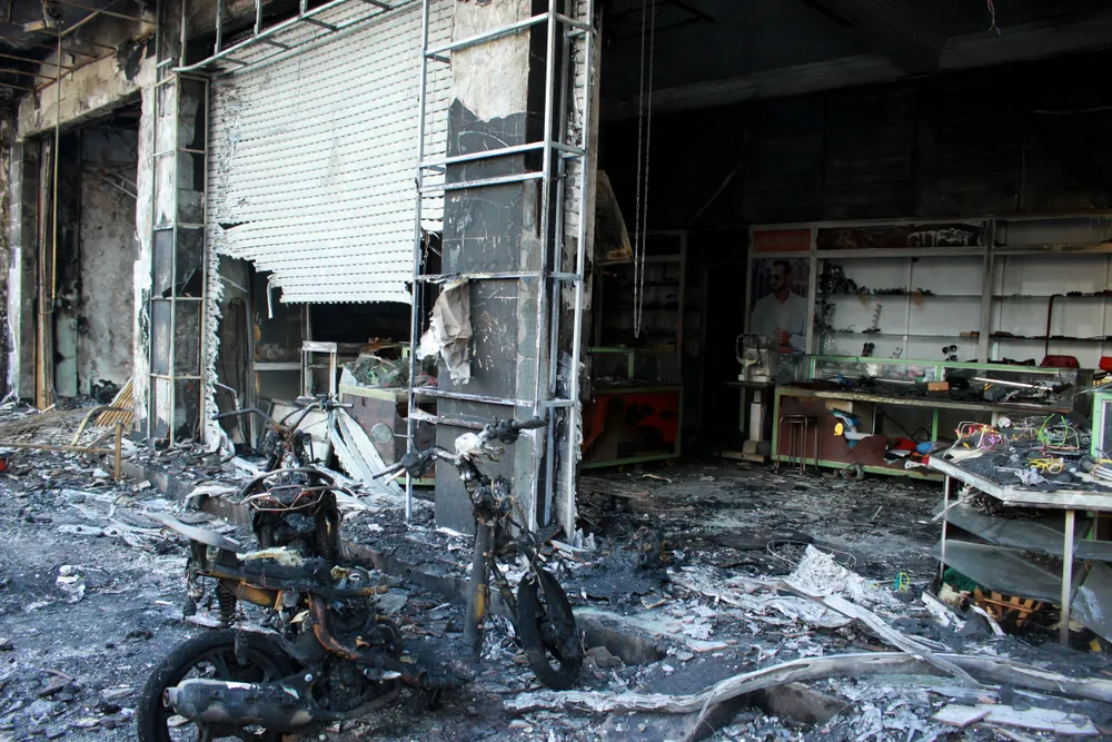 Hiện trường vụ hỏa hoạn thiêu rụi 2 căn nhà liền kề ở Quảng Ngãi ảnh 4