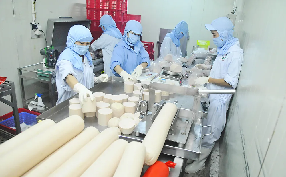 Doanh nghiệp chế biến thực phẩm nội: Đứng vững trong khó khăn ảnh 1