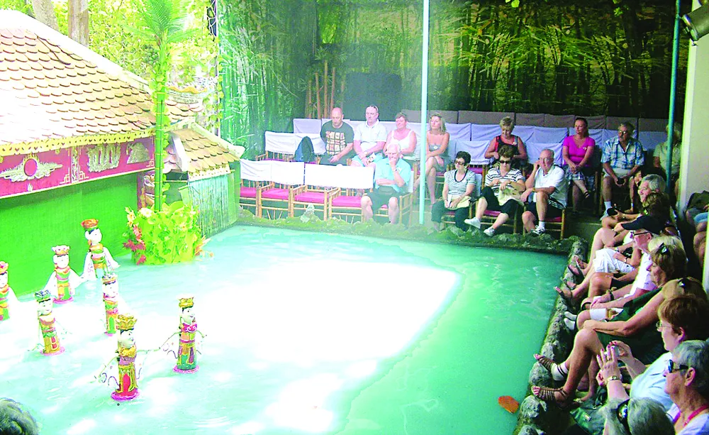 Cuối tuần đi xem rối nước ảnh 1