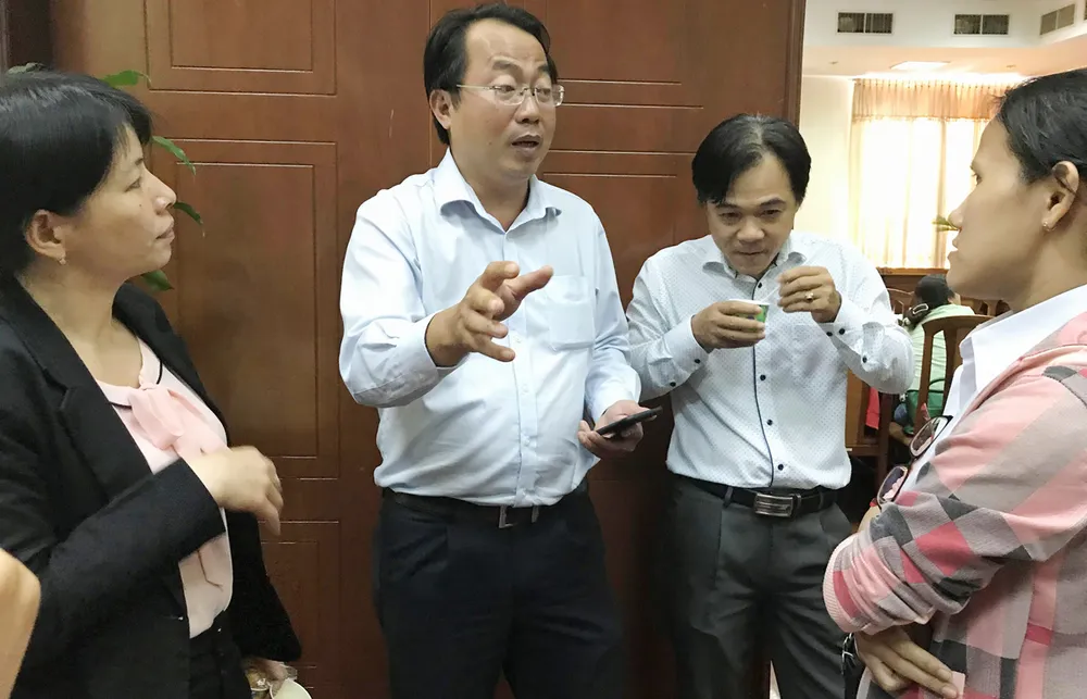 Đối thoại, giúp doanh nghiệp gỡ rối về lao động và BHXH ảnh 1