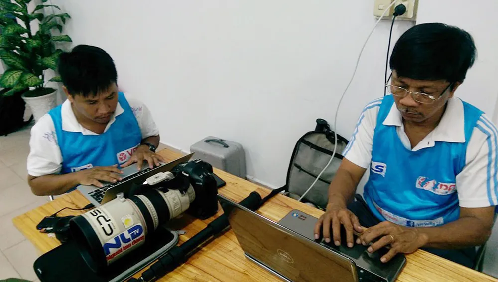 Nghề báo trên từng chặng đường tác nghiệp ảnh 11