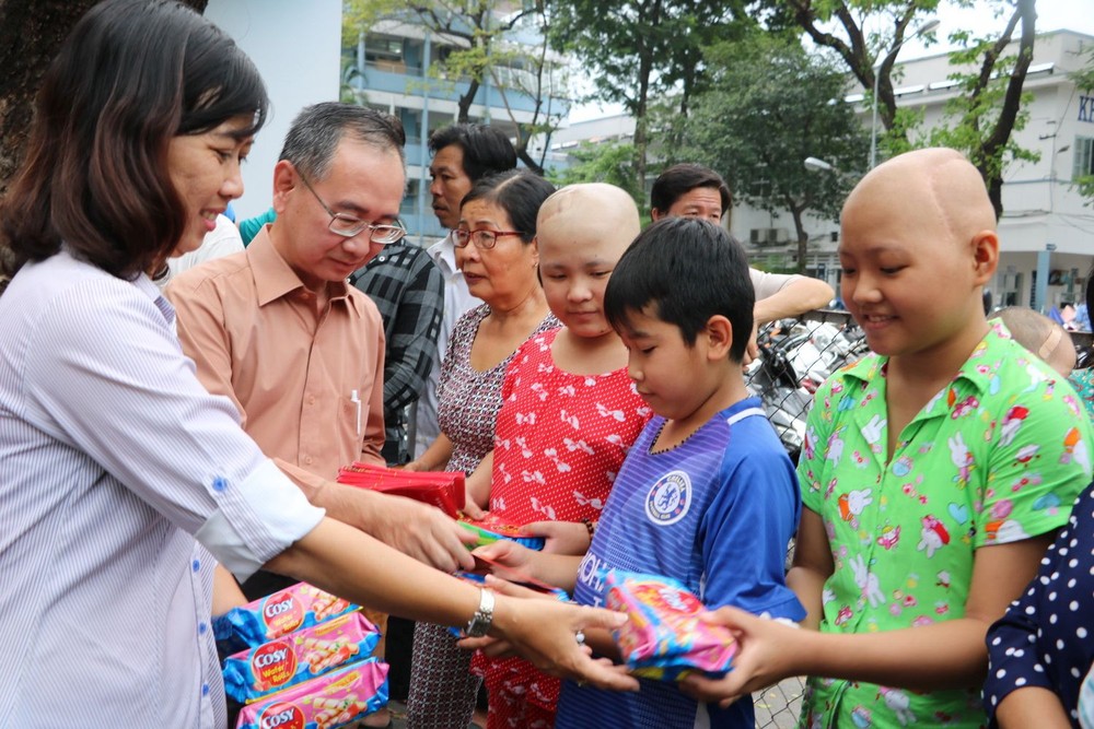 本報濟貧善款近 2 億元 ảnh 3