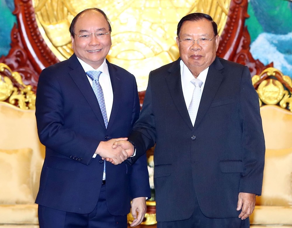阮春福總理會見老撾總書記、國家主席本揚‧沃拉吉。（圖源：統一）
