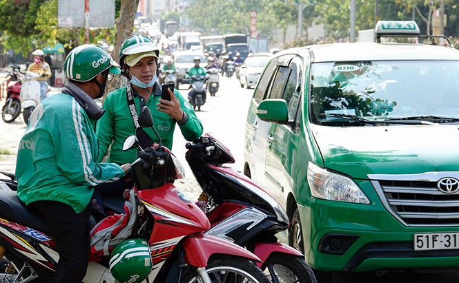 GrabCar網約車在本市接送乘客。（圖源：獨立）