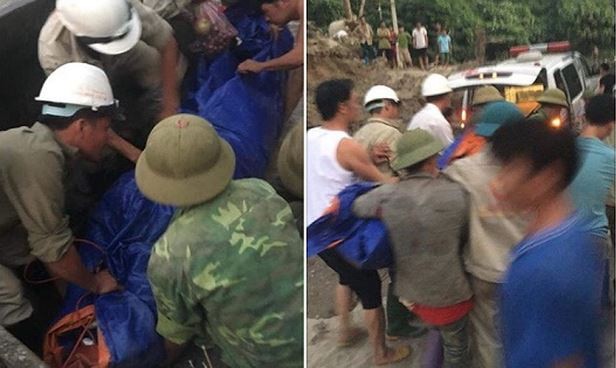 工人們將遇難者的屍體裹起來送上救護車。（圖源：互聯網）