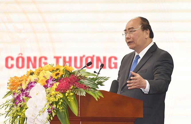 政府總理阮春福在會議上發表講話。（圖源：光孝）