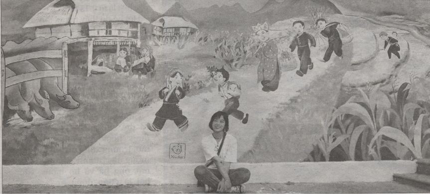 畫家與志願者在某所學校創作的一幅畫。