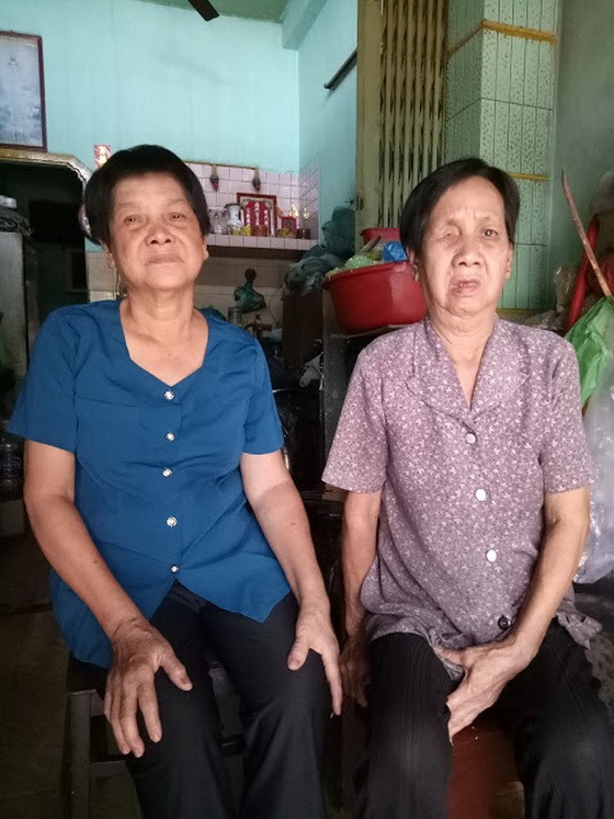 湯女（右）和妹妹都患有多種病。