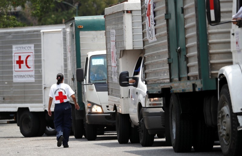 首批紅十字會人道救援物資已運抵委國。（圖源：路透社）