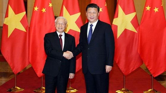 黨中央總書記、國家主席阮富仲（左）與中共中央總書記、中國國家主席習近平。（圖源：越通社）