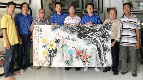 越中書畫家與合作的《藝海揚波》作品。