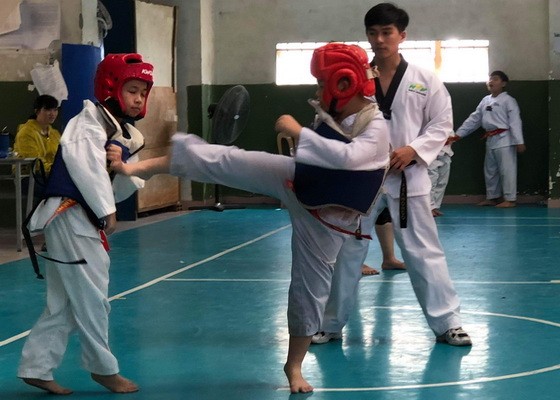 第五郡少兒參加跆拳道比賽。