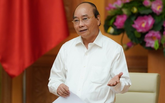 政府總理阮春福主持會議。（圖源：光孝）