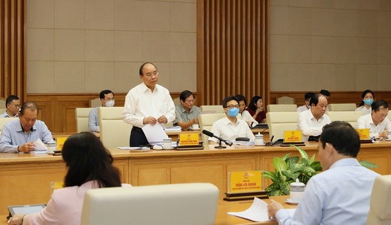 政府總理阮春福在會上發言。（圖源：光福）