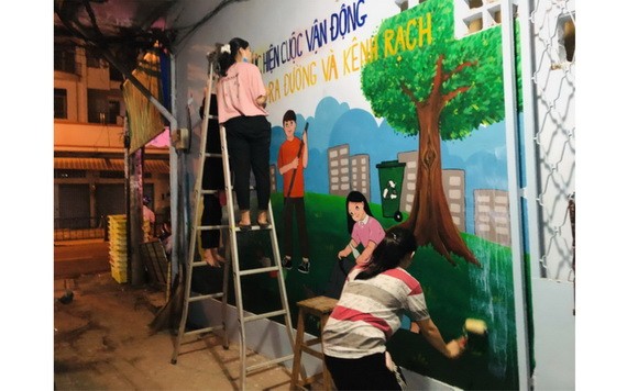 第五郡第十四坊青年美化巷道活動。