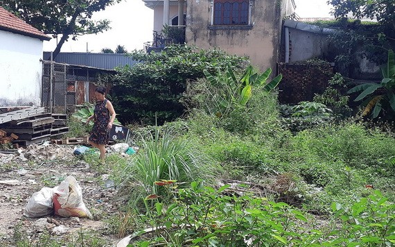 阮玉福的地皮已完成土地使用費義務，但不能將使用目的從園地轉換成住宅用地。