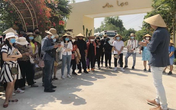 一旅遊團在參觀區內景點。（圖源：越通社）