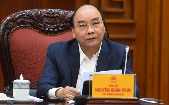 政府總理阮春福主持政府常務處會議。（圖源：光孝）