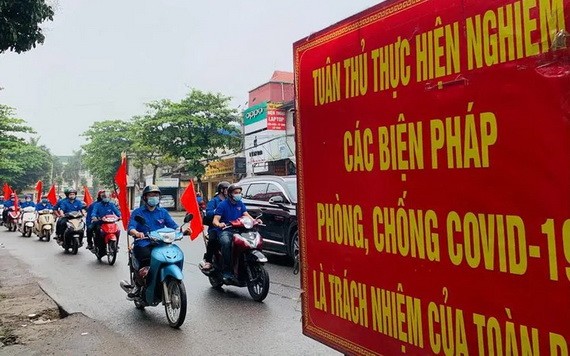 圖為河內市疫情防控宣傳的流動車隊。（圖源：月映）