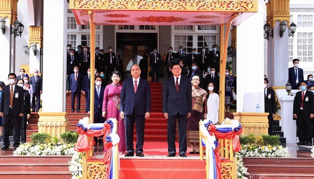 越老簽署與交換 14 份合作文件 ảnh 1