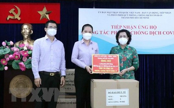 防疫款物交接儀式。（圖源：越通社）