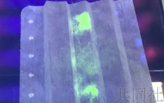 日本研發黑光燈照射測新冠病毒口罩