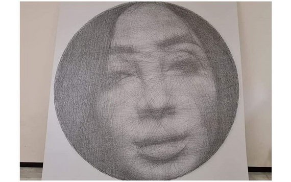 用釘及線製巨型肖像畫創紀錄