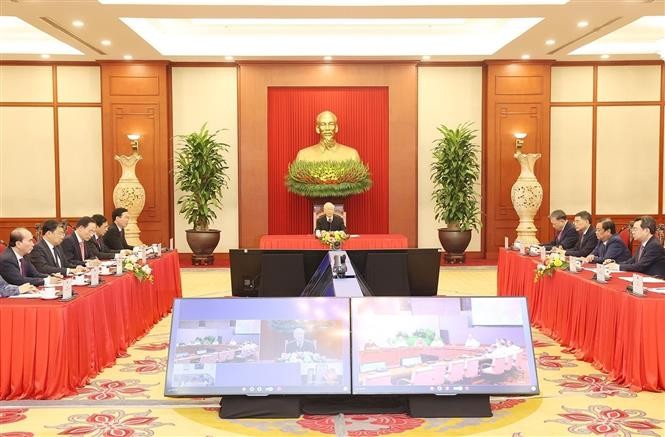 黨中央總書記阮富仲與古共中央第一書記、古巴共和國國家主席迪亞斯·卡內爾通電話。（圖：越通社）