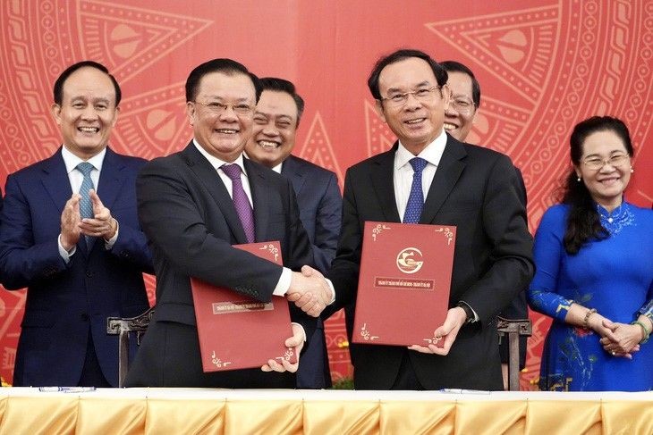 本市市委与河内市委签署合作计划备忘录。（图：友幸）