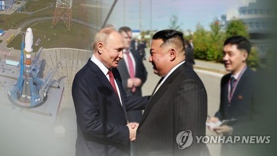 金正恩（右）与普京。（图：韩联社）